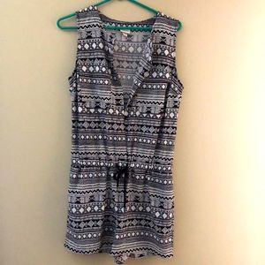 Romper with black and white print. Size medium.